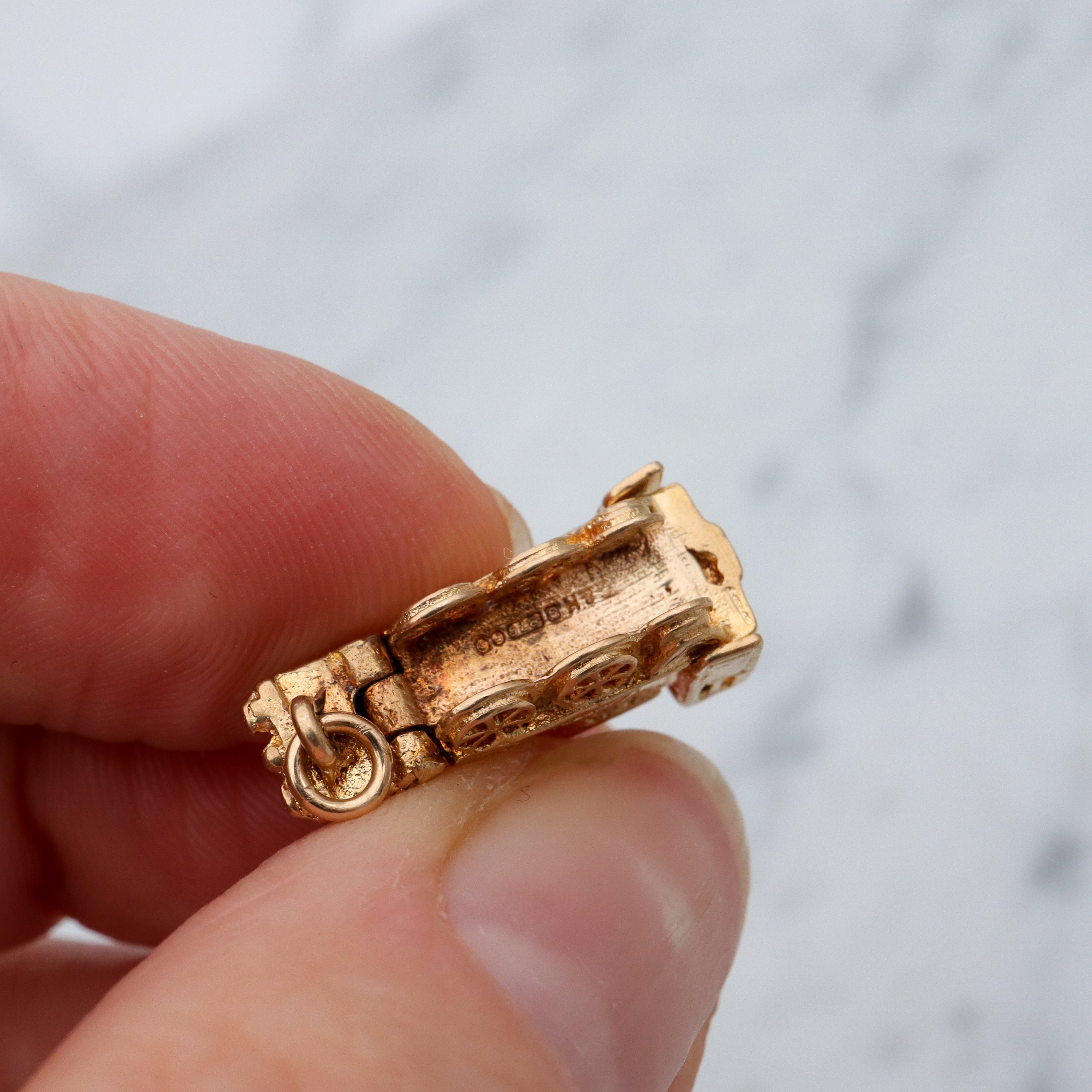 Vintage English 9k gold opening “Bon Voyage” locomotive charm